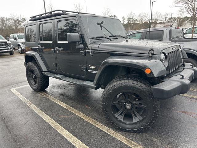 used 2014 Jeep Wrangler Unlimited car, priced at $13,969