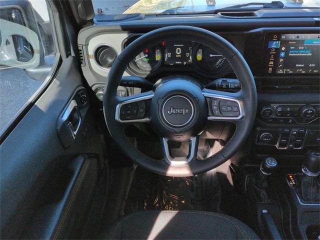 used 2024 Jeep Wrangler 4xe car, priced at $35,966