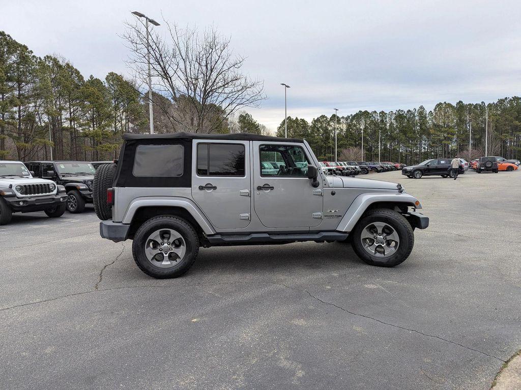 used 2018 Jeep Wrangler JK Unlimited car, priced at $21,998