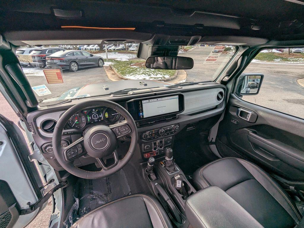 used 2024 Jeep Wrangler 4xe car, priced at $35,498