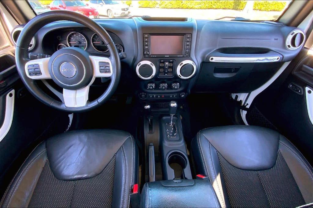 used 2015 Jeep Wrangler Unlimited car, priced at $16,995