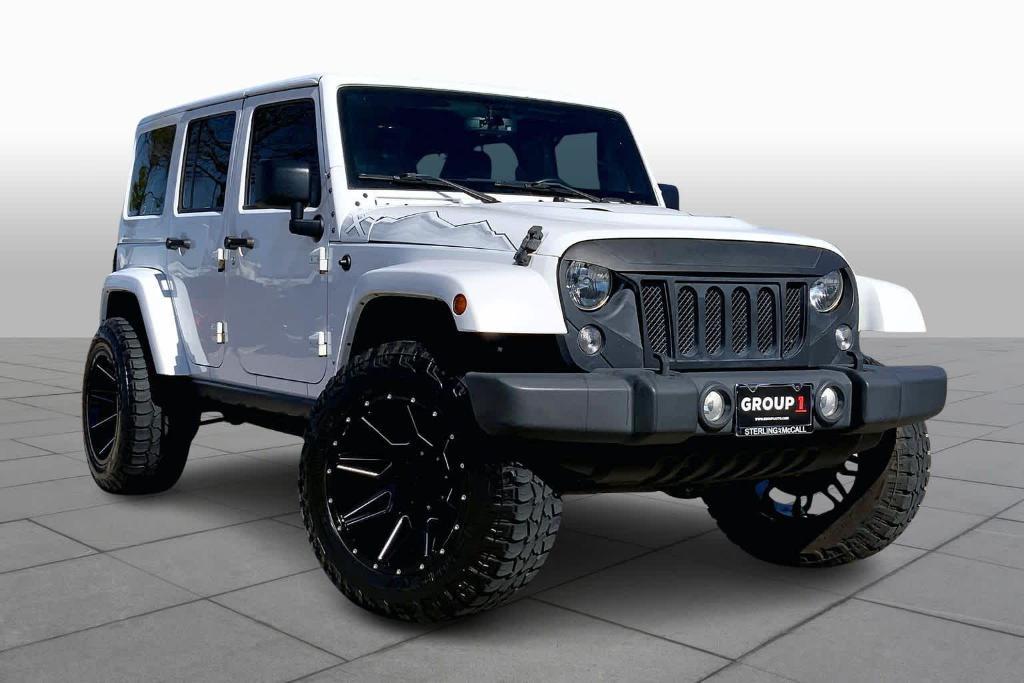 used 2015 Jeep Wrangler Unlimited car, priced at $16,995