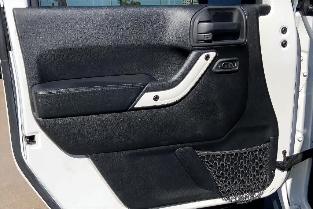 used 2015 Jeep Wrangler Unlimited car, priced at $16,995