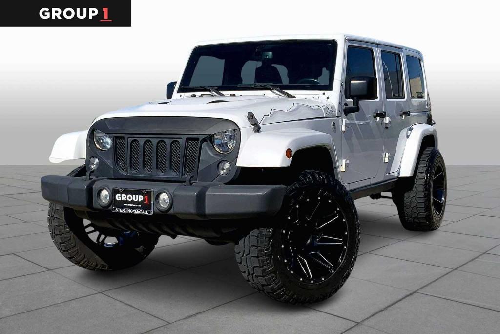 used 2015 Jeep Wrangler Unlimited car, priced at $16,995