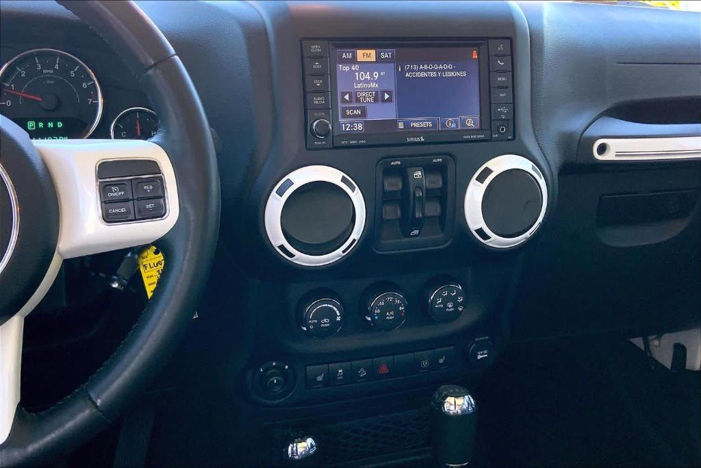 used 2015 Jeep Wrangler Unlimited car, priced at $16,995