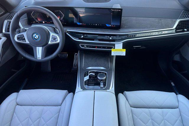new 2026 BMW X5 PHEV car, priced at $90,050