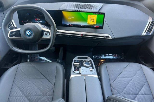 used 2024 BMW iX car, priced at $54,084