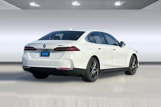 used 2025 BMW i5 car, priced at $61,997