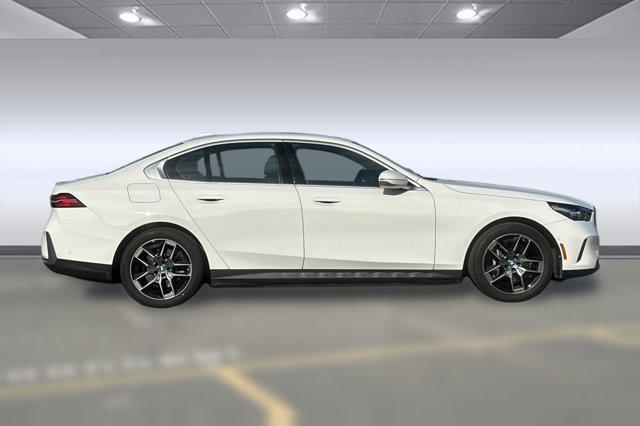 used 2025 BMW i5 car, priced at $61,997