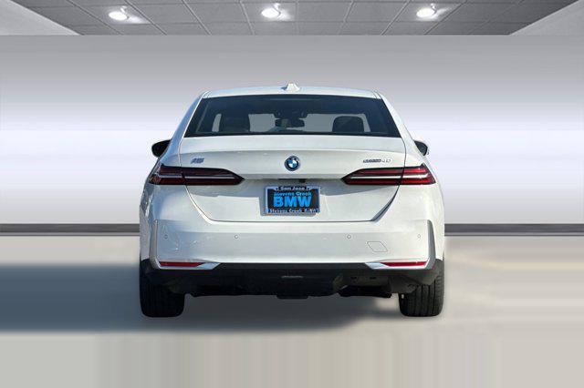 used 2025 BMW i5 car, priced at $61,997