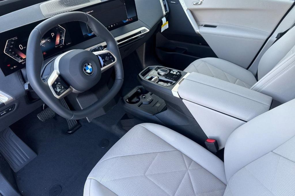 new 2026 BMW iX car, priced at $85,195