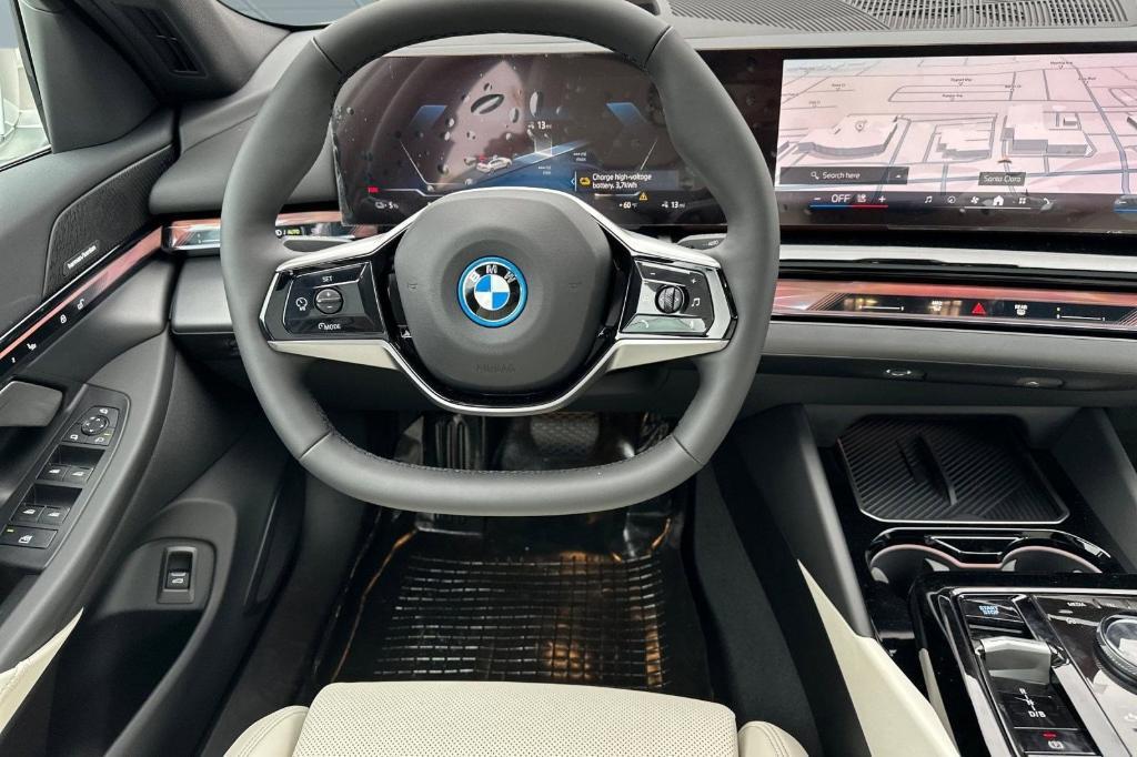 used 2025 BMW i5 car, priced at $62,997