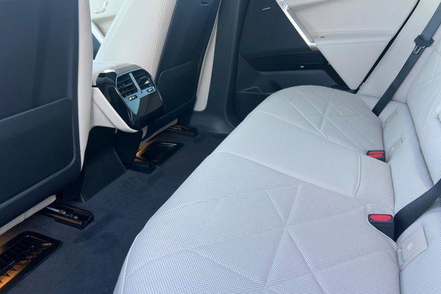 new 2026 BMW iX car, priced at $85,795