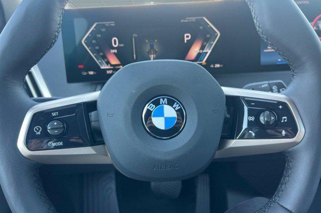 new 2026 BMW iX car, priced at $85,795
