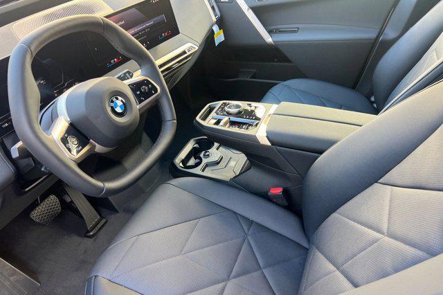 new 2026 BMW iX car, priced at $83,195