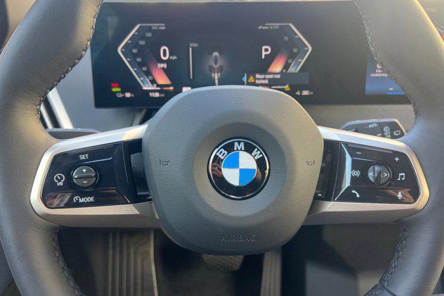 new 2026 BMW iX car, priced at $83,195