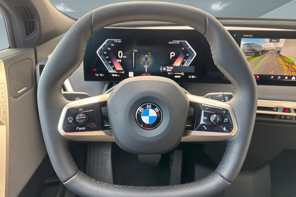 new 2026 BMW iX car, priced at $83,870