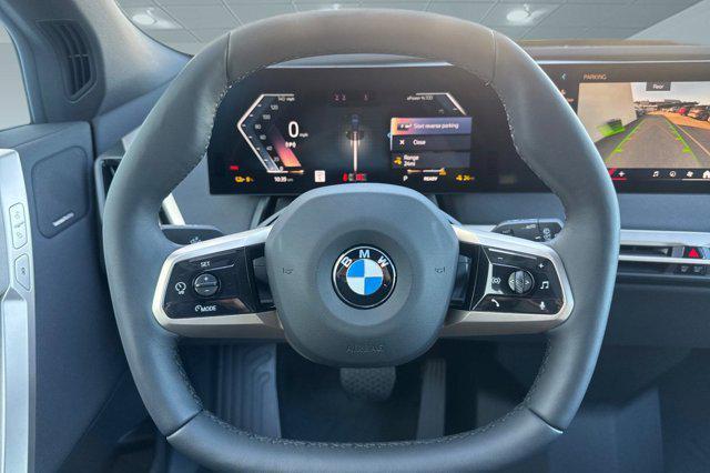 new 2026 BMW iX car, priced at $85,795