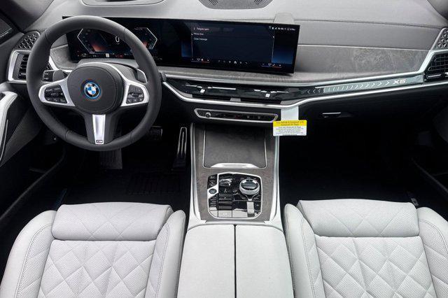 new 2026 BMW X5 PHEV car, priced at $91,450