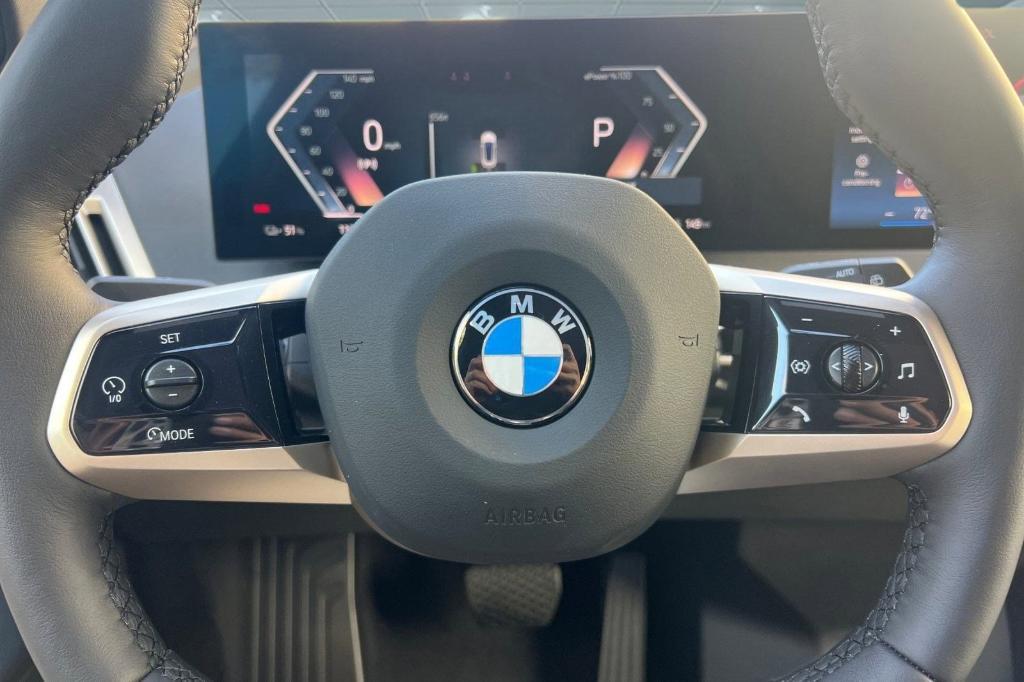 new 2026 BMW iX car, priced at $85,795