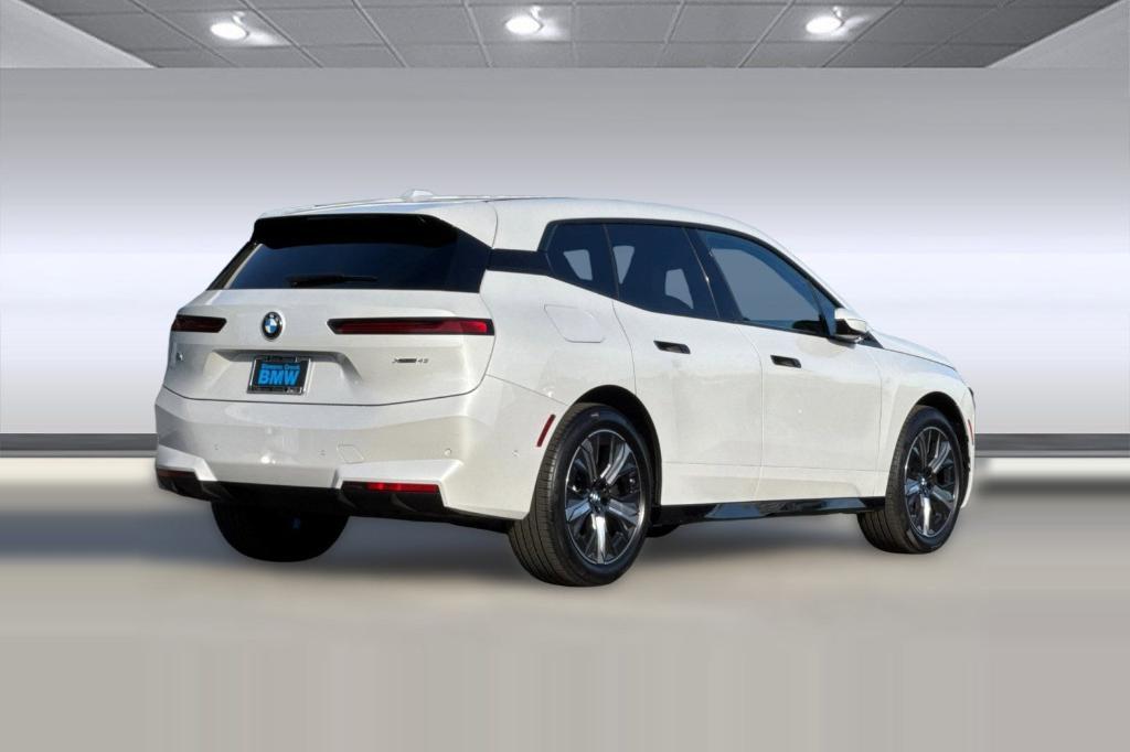 new 2026 BMW iX car, priced at $83,520