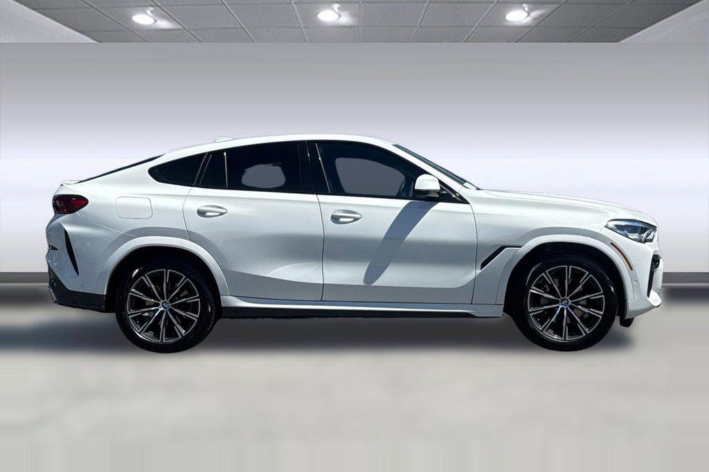used 2023 BMW X6 car, priced at $51,573
