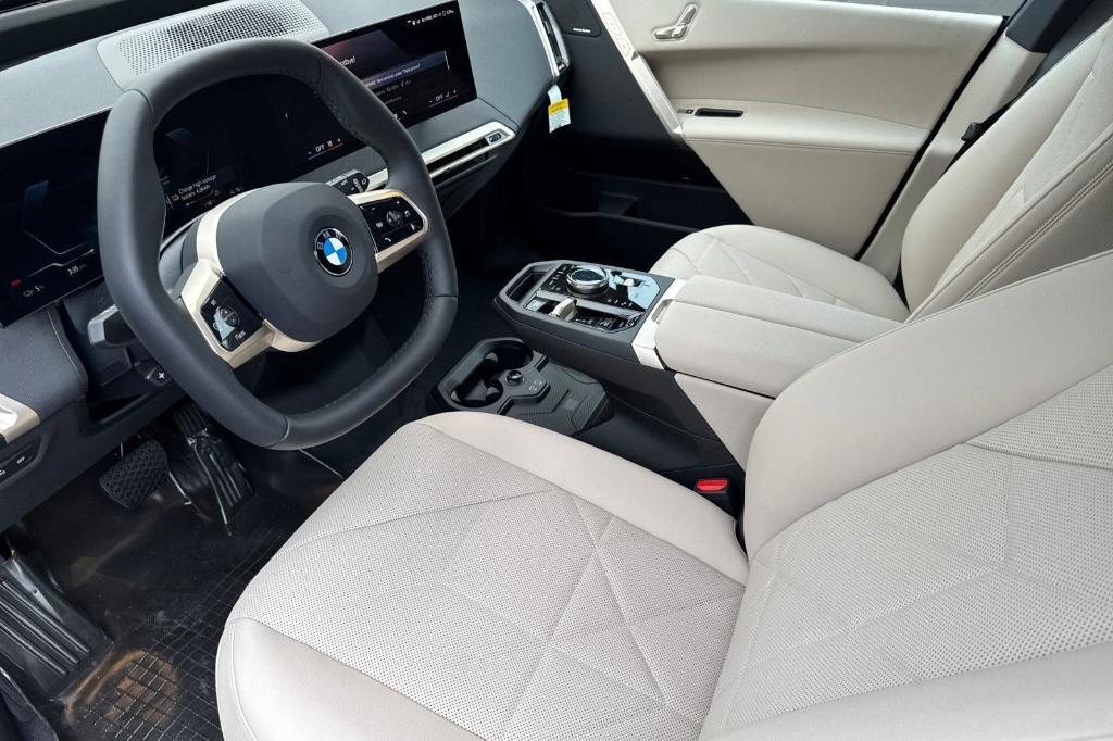 new 2026 BMW iX car, priced at $83,870