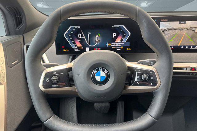 new 2026 BMW iX car, priced at $85,595