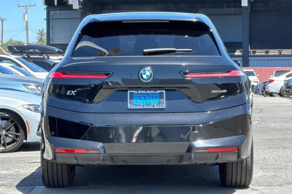 used 2024 BMW iX car, priced at $50,573