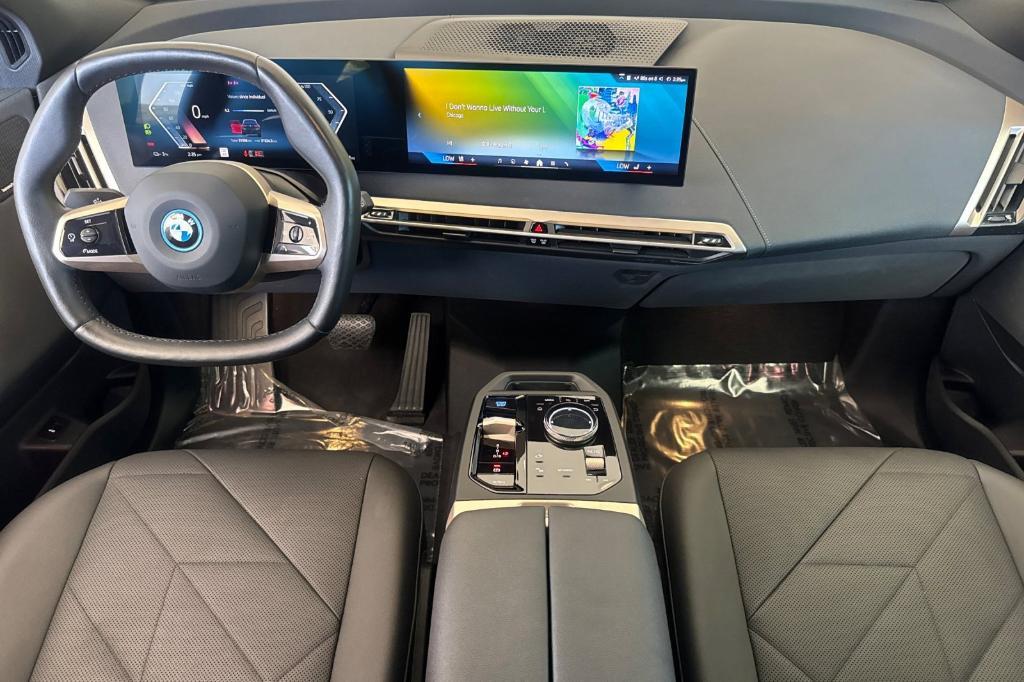 used 2024 BMW iX car, priced at $50,573