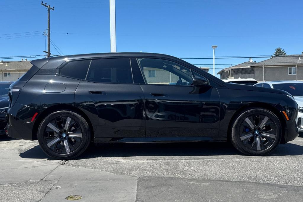 used 2024 BMW iX car, priced at $50,573