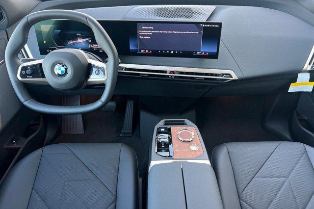 new 2026 BMW iX car, priced at $85,595