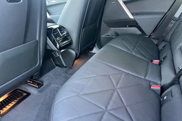 new 2026 BMW iX car, priced at $85,595