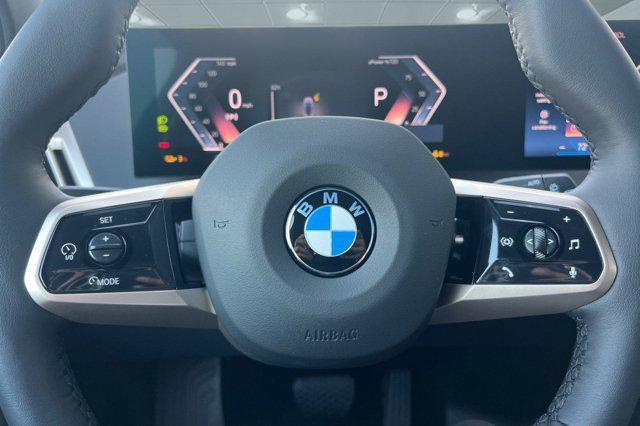 new 2026 BMW iX car, priced at $85,595