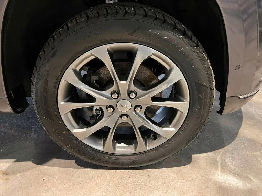 used 2021 Jeep Grand Cherokee car, priced at $30,803