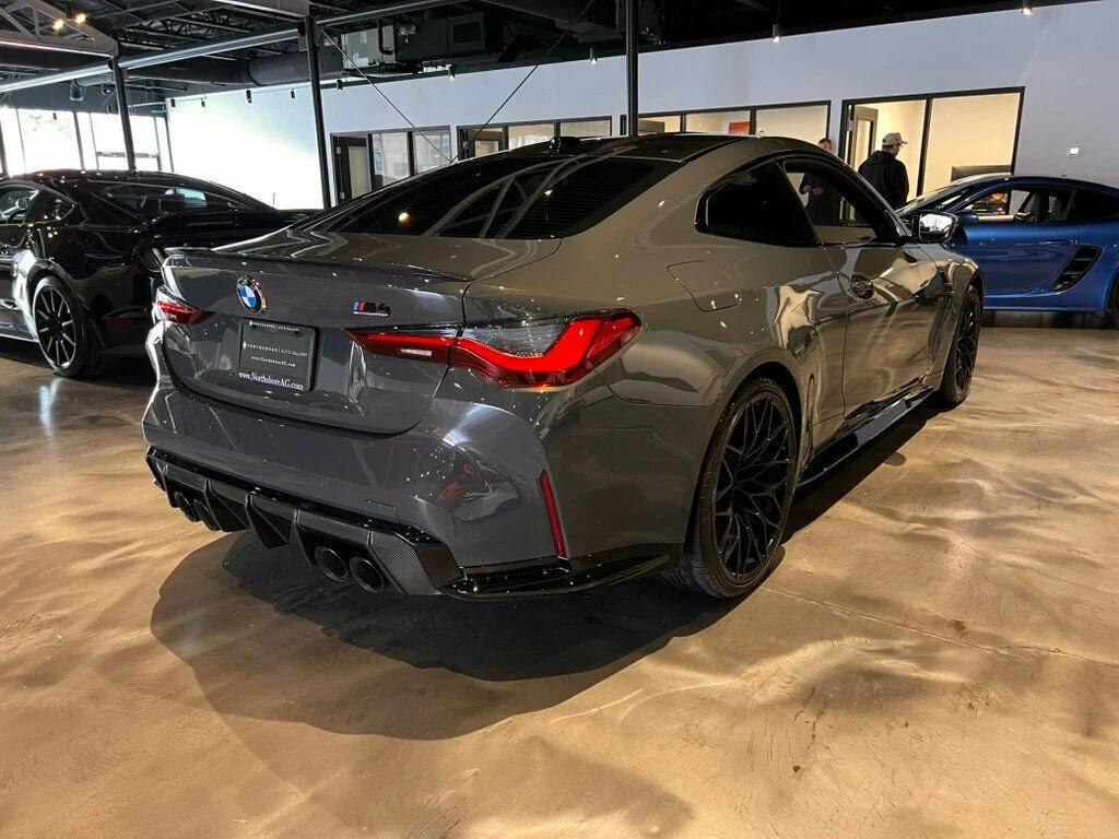 used 2024 BMW M4 car, priced at $73,680