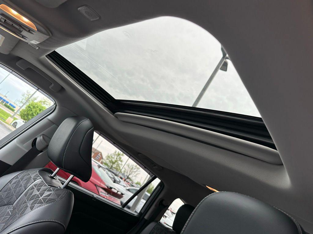 used 2024 Toyota Highlander Hybrid car, priced at $43,990