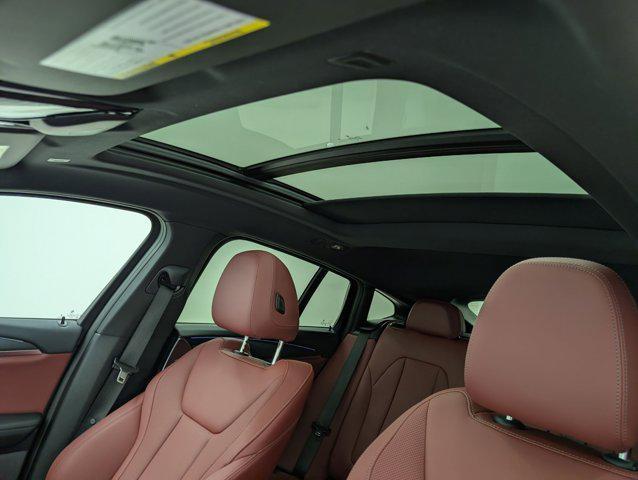 used 2025 BMW X4 car, priced at $49,999