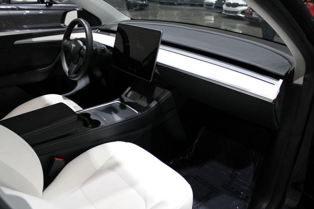 used 2024 Tesla Model Y car, priced at $30,800