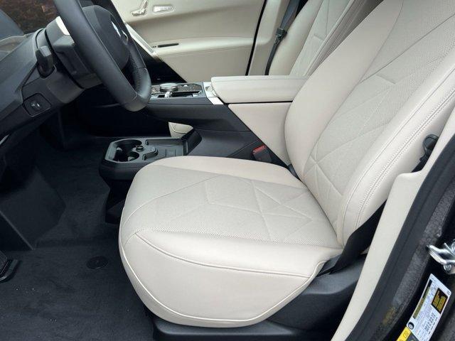 new 2026 BMW iX car, priced at $97,825