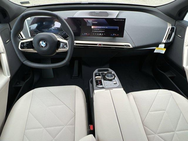 new 2026 BMW iX car, priced at $97,825