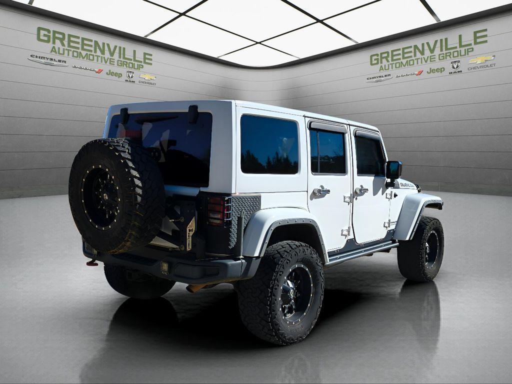 used 2014 Jeep Wrangler Unlimited car, priced at $18,709