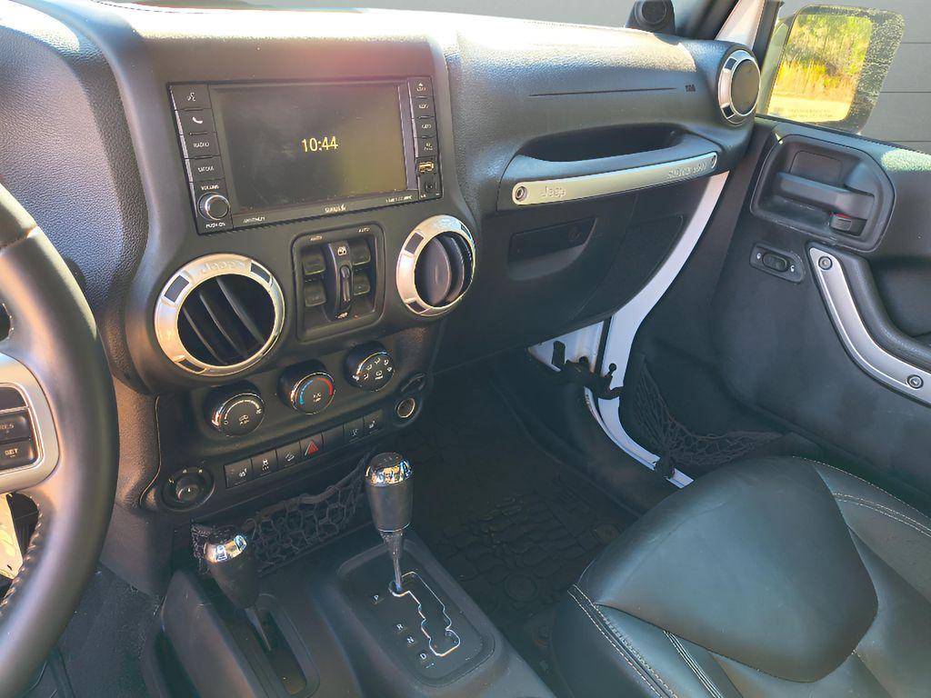 used 2014 Jeep Wrangler Unlimited car, priced at $18,709