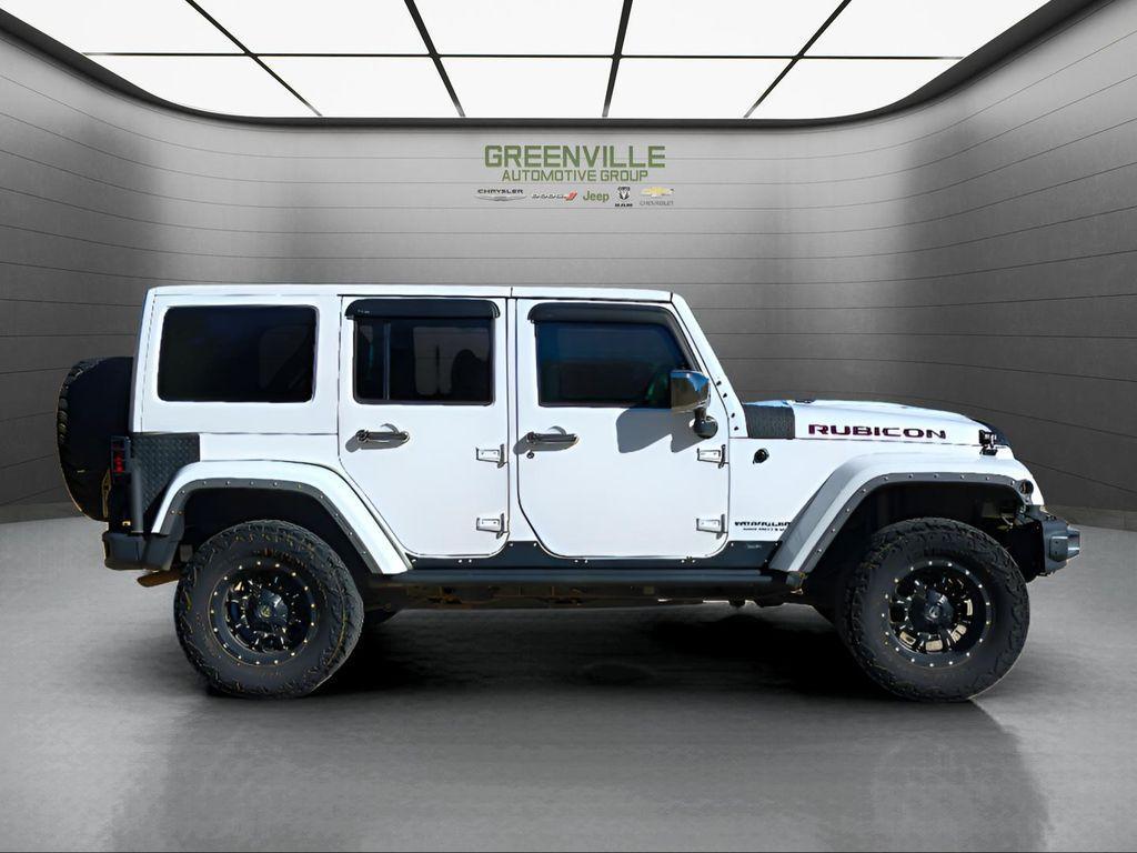 used 2014 Jeep Wrangler Unlimited car, priced at $18,709