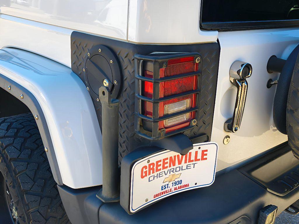 used 2014 Jeep Wrangler Unlimited car, priced at $18,709