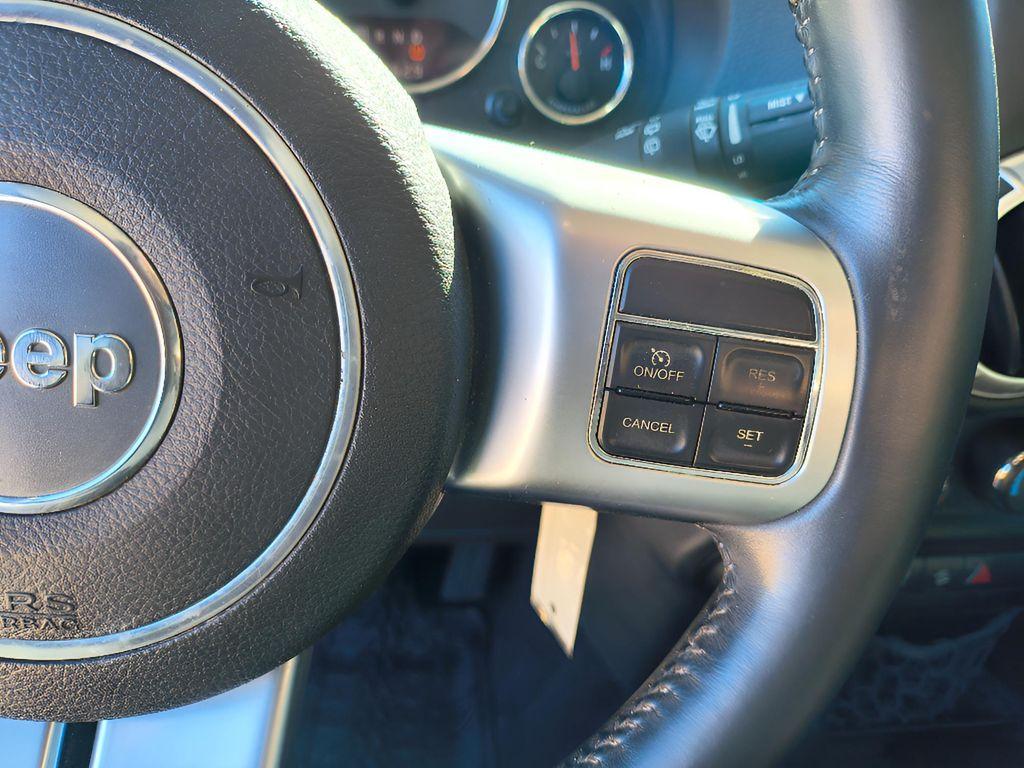 used 2014 Jeep Wrangler Unlimited car, priced at $18,709