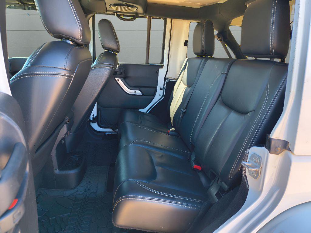 used 2014 Jeep Wrangler Unlimited car, priced at $18,709