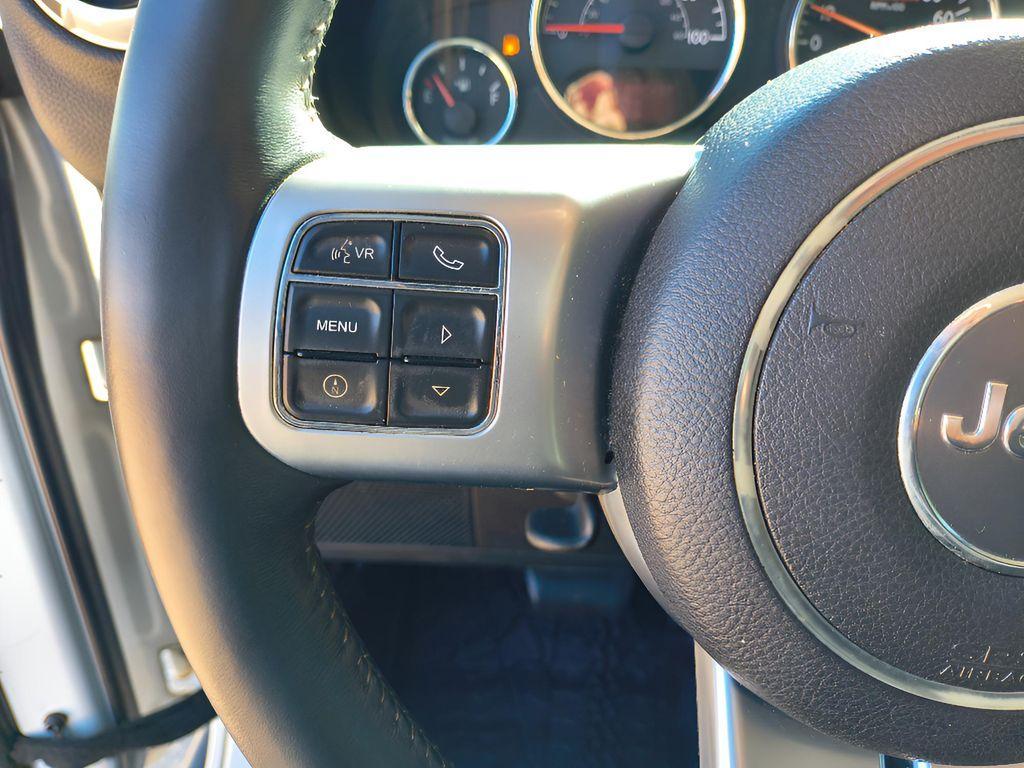 used 2014 Jeep Wrangler Unlimited car, priced at $18,709