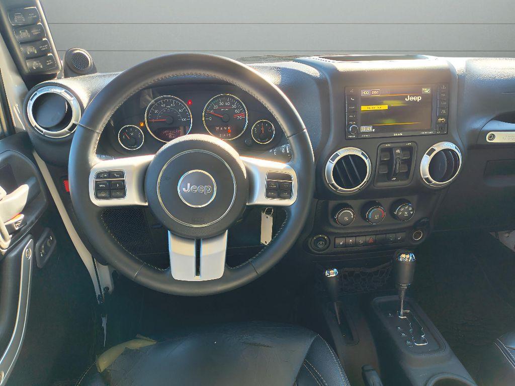 used 2014 Jeep Wrangler Unlimited car, priced at $18,709