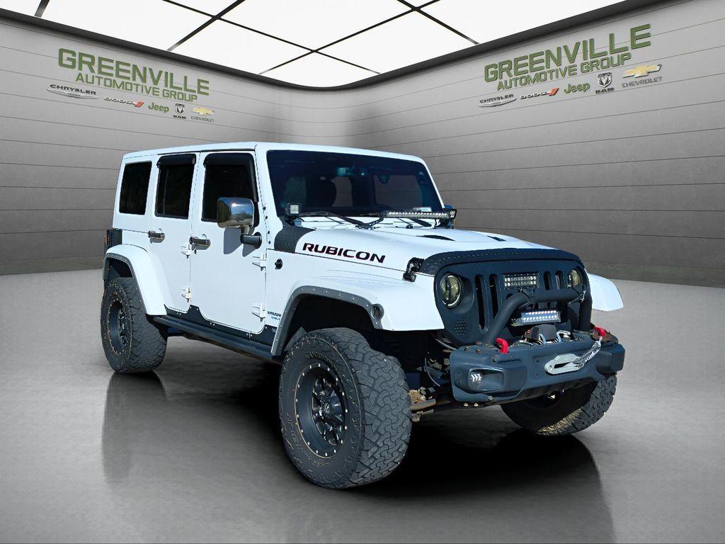 used 2014 Jeep Wrangler Unlimited car, priced at $18,709